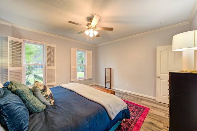 5631 Spring Lodge Dr, Houston, TX 77345 - bedroom featuring light wood finished floors, crown molding, and ceiling fan