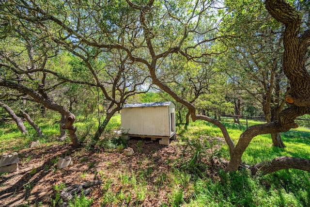 172 Candy Rd, Pipe Creek, TX 78063 - view of yard with a shed