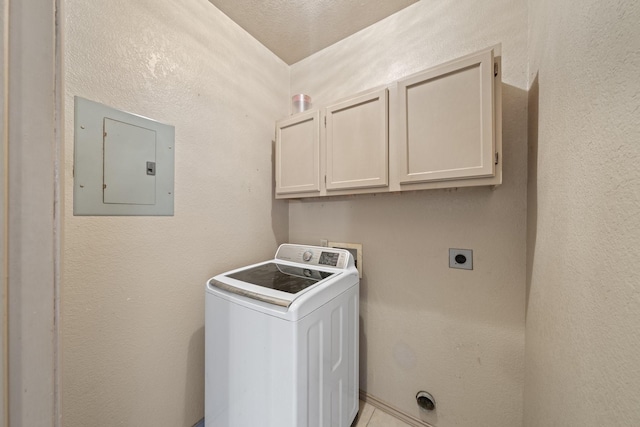172 Candy Rd, Pipe Creek, TX 78063 - laundry room with washer / clothes dryer, electric panel, and cabinet space