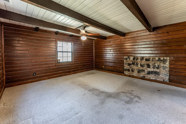 800 Fm 980 S, Point Blank, TX 77364 - empty room with carpet flooring, beamed ceiling, wood walls, and ceiling fan