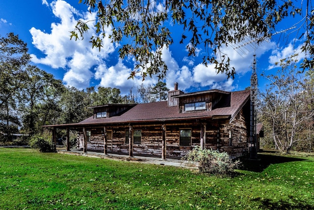 800 Fm 980 S, Point Blank, TX 77364 - rear view of property featuring a yard and a chimney