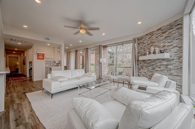 6628 Bayou Glen Rd Unit 6628, Houston, TX 77057 - living room featuring wood finished floors, a ceiling fan, and recessed lighting