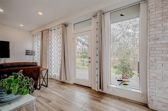 6628 Bayou Glen Rd Unit 6628, Houston, TX 77057 - entryway featuring wood finished floors, plenty of natural light, and recessed lighting