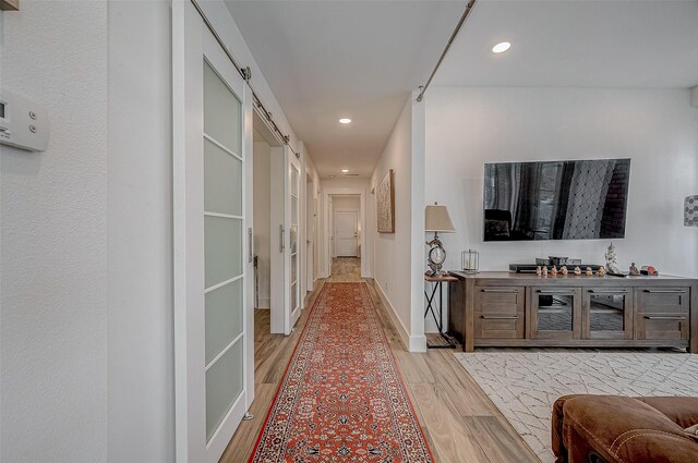 6628 Bayou Glen Rd Unit 6628, Houston, TX 77057 - corridor with light wood finished floors and recessed lighting