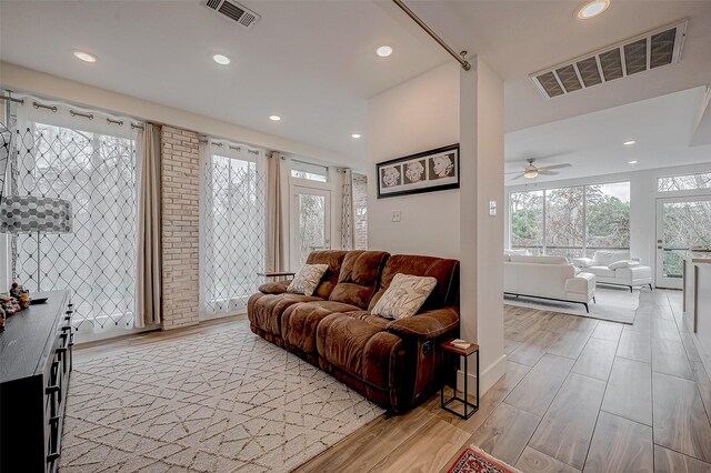 6628 Bayou Glen Rd Unit 6628, Houston, TX 77057 - living room featuring recessed lighting, a ceiling fan, and light wood-style floors
