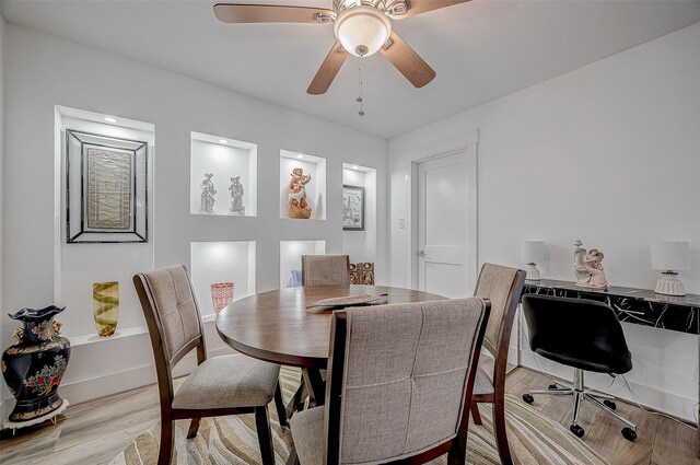 6628 Bayou Glen Rd Unit 6628, Houston, TX 77057 - dining space with wood finished floors, ceiling fan, and a desk
