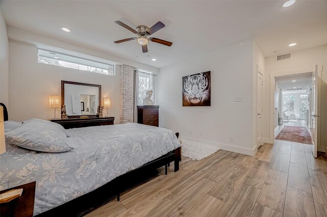 6628 Bayou Glen Rd Unit 6628, Houston, TX 77057 - bedroom featuring light wood finished floors, recessed lighting, and a ceiling fan