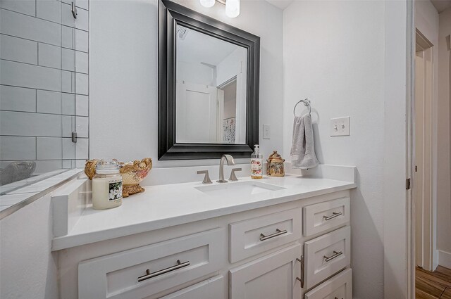 6628 Bayou Glen Rd Unit 6628, Houston, TX 77057 - bathroom featuring vanity and wood finished floors