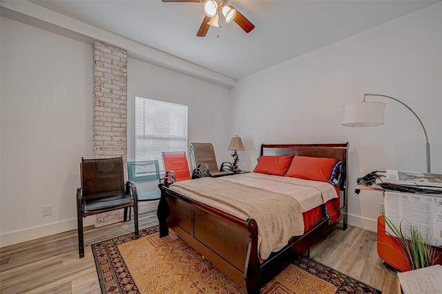 6628 Bayou Glen Rd Unit 6628, Houston, TX 77057 - bedroom featuring light wood-style flooring and ceiling fan