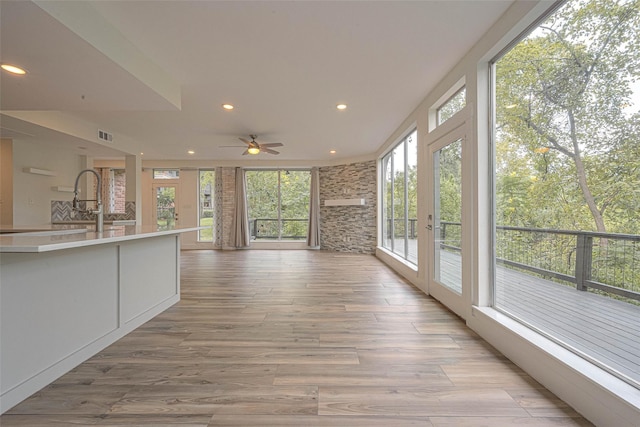 6628 Bayou Glen Rd Unit 6628, Houston, TX 77057 - unfurnished sunroom featuring recessed lighting, french doors, and wood finished floors