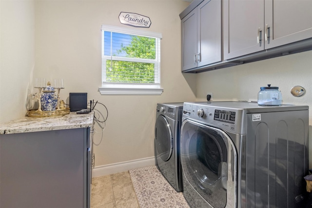13336 Lake Breeze Ln, Willis, TX 77318 - washroom featuring cabinet space and washing machine and clothes dryer