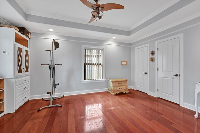 5227 Falvey St, Houston, TX 77017 - unfurnished bedroom with a raised ceiling, hardwood / wood-style flooring, crown molding, and recessed lighting
