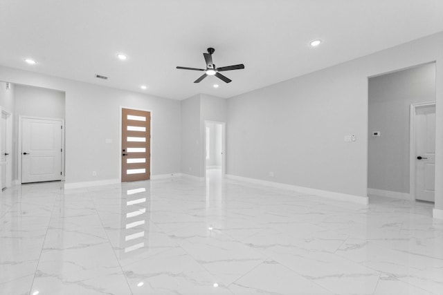 327 Paradise Ln, Montgomery, TX 77356 - empty room with recessed lighting, ceiling fan, and light marble finish floors
