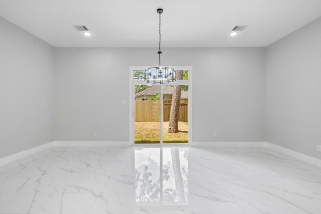 327 Paradise Ln, Montgomery, TX 77356 - empty room with a chandelier, marble finish floors, and recessed lighting