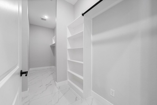 327 Paradise Ln, Montgomery, TX 77356 - spacious closet featuring marble finish floors