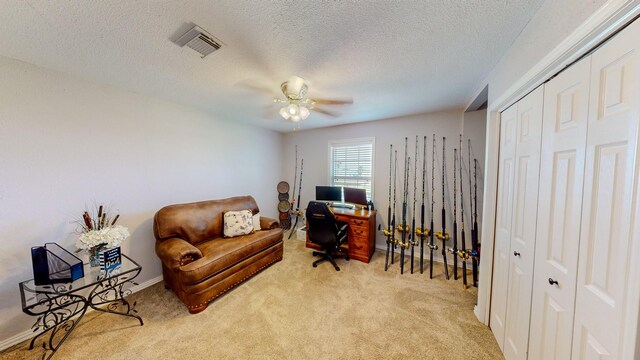 110 Four Master Rd, Freeport, TX 77541 - carpeted home office with ceiling fan and a textured ceiling