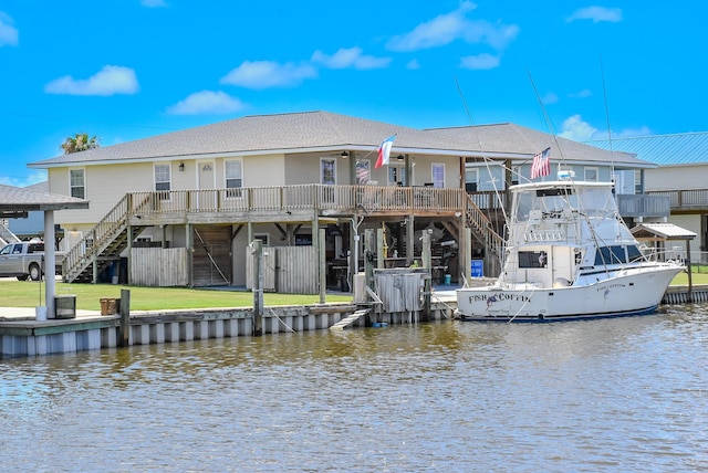 110 Four Master Rd, Freeport, TX 77541 - rear view of property with stairway and a deck with water view