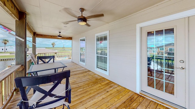 110 Four Master Rd, Freeport, TX 77541 - wooden terrace featuring a ceiling fan