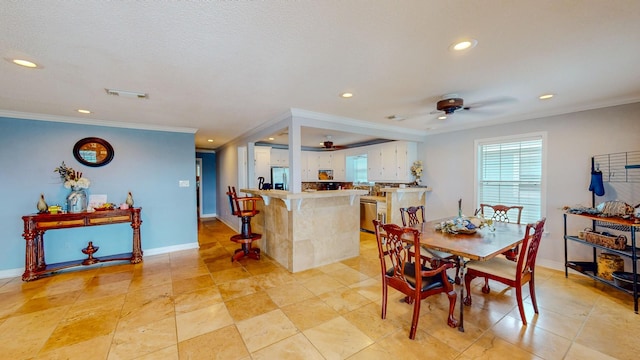 110 Four Master Rd, Freeport, TX 77541 - dining area with ceiling fan, crown molding, and recessed lighting