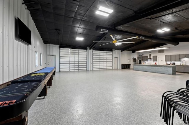 110 Four Master Rd, Freeport, TX 77541 - garage with ceiling fan and a sink
