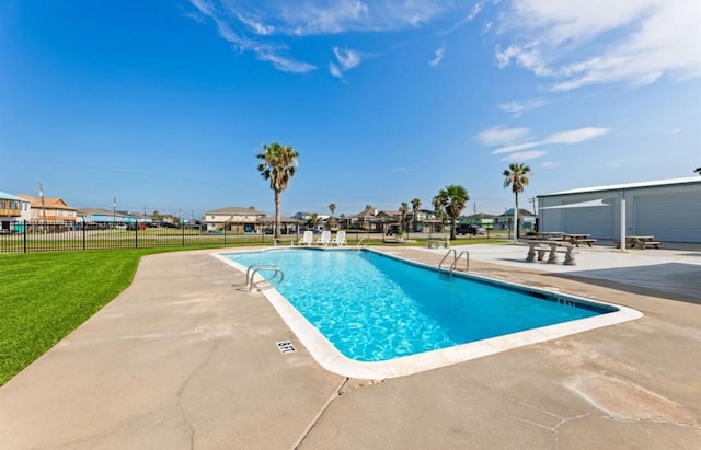110 Four Master Rd, Freeport, TX 77541 - community pool with a patio area and a residential view