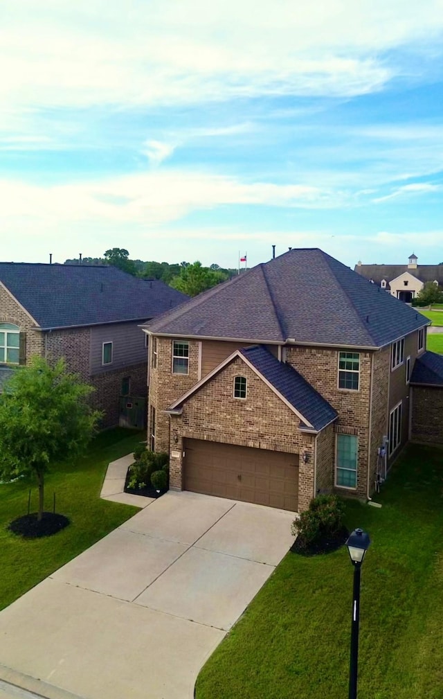 18718 Fairmont Springs Ct, Cypress, TX 77429 - traditional-style house with driveway, a front lawn, brick siding, an attached garage, and roof with shingles