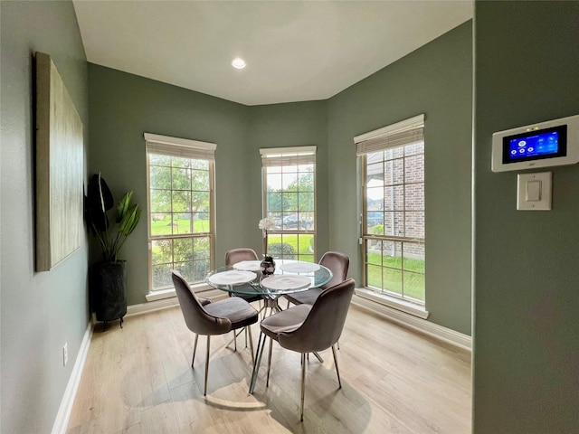 18718 Fairmont Springs Ct, Cypress, TX 77429 - dining room with light wood finished floors and recessed lighting