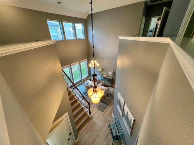 18718 Fairmont Springs Ct, Cypress, TX 77429 - living room with a high ceiling and wood finished floors