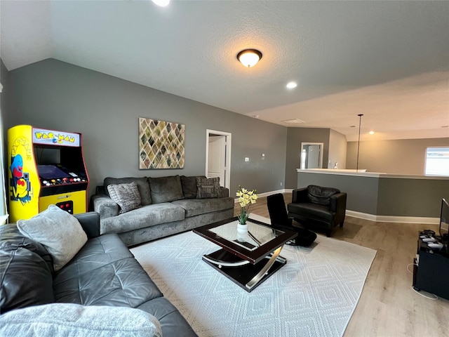 18718 Fairmont Springs Ct, Cypress, TX 77429 - living area with wood finished floors and vaulted ceiling
