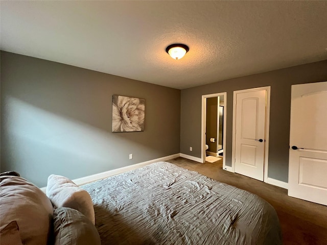 18718 Fairmont Springs Ct, Cypress, TX 77429 - bedroom featuring a textured ceiling and carpet floors