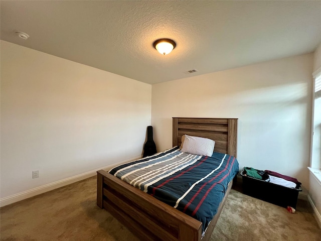 18718 Fairmont Springs Ct, Cypress, TX 77429 - bedroom featuring carpet and a textured ceiling