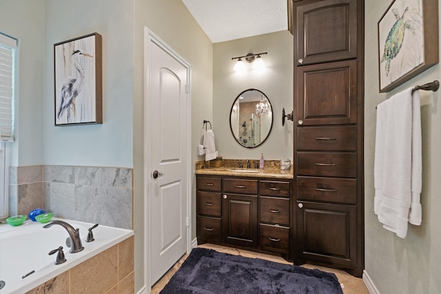 6430 Willow Pine Dr, Spring, TX 77379 - bathroom featuring vanity and a bath