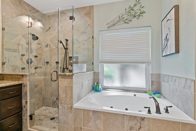 6430 Willow Pine Dr, Spring, TX 77379 - full bath featuring a whirlpool tub, a shower stall, and vanity