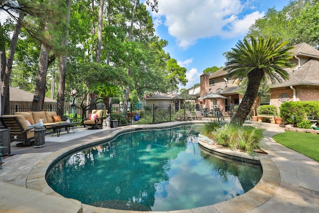 6430 Willow Pine Dr, Spring, TX 77379 - view of swimming pool with an outdoor living space, a fenced backyard, and a patio area