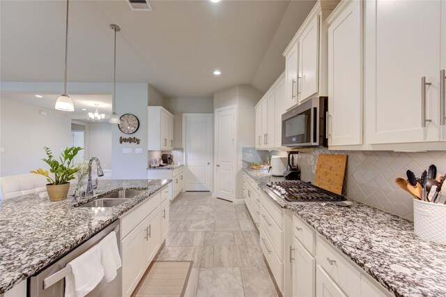 3502 Harper Ferry Pl, Katy, TX 77494 - kitchen with stainless steel appliances, decorative backsplash, recessed lighting, and white cabinetry