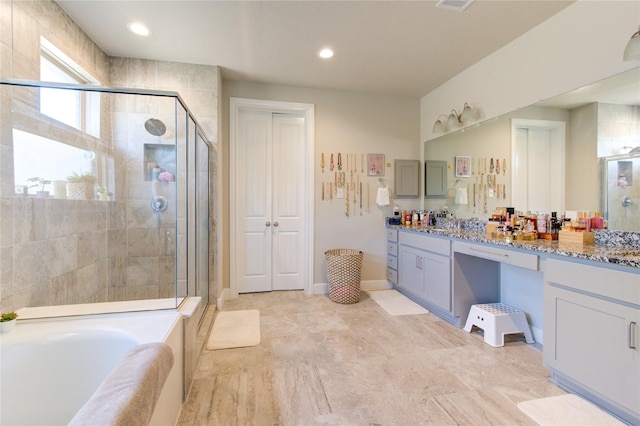 3502 Harper Ferry Pl, Katy, TX 77494 - full bathroom featuring vanity, a shower stall, a garden tub, and recessed lighting