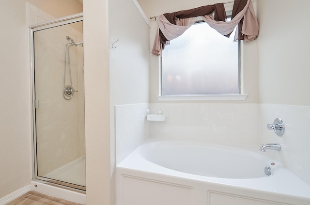 8711 Chamomile Meadow Trl, Katy, TX 77494 - full bathroom with a shower stall and a garden tub
