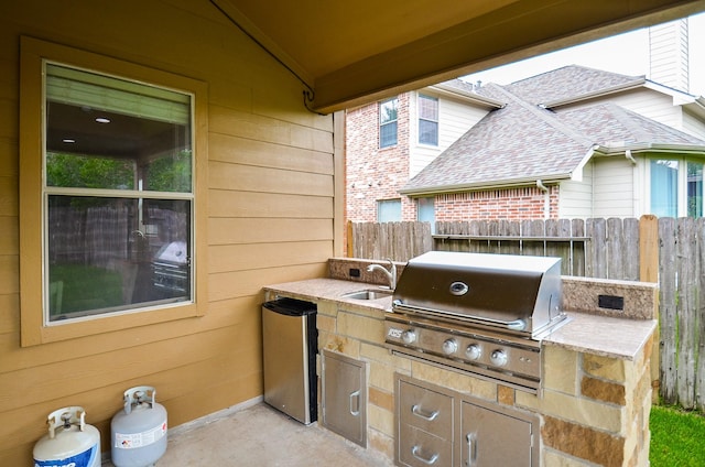 8711 Chamomile Meadow Trl, Katy, TX 77494 - view of patio / terrace with a sink and exterior kitchen