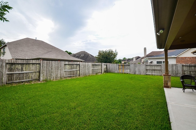 8711 Chamomile Meadow Trl, Katy, TX 77494 - fenced backyard with a patio
