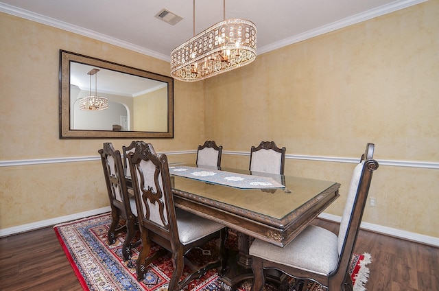 8711 Chamomile Meadow Trl, Katy, TX 77494 - dining space featuring wood finished floors, a chandelier, and crown molding