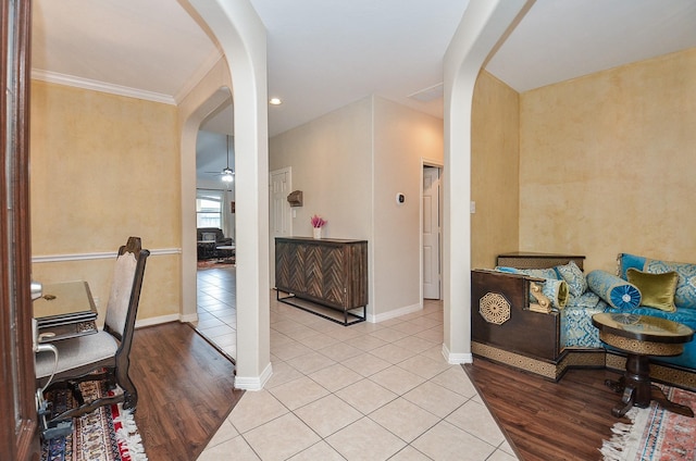 8711 Chamomile Meadow Trl, Katy, TX 77494 - corridor with arched walkways, tile patterned floors, and crown molding