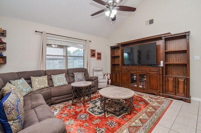 8711 Chamomile Meadow Trl, Katy, TX 77494 - living area with a ceiling fan, light tile patterned floors, and high vaulted ceiling