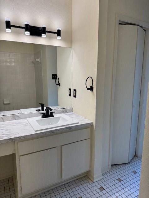 9001 Imogene St Unit A, Houston, TX 77036 - bathroom with vanity and tile patterned floors