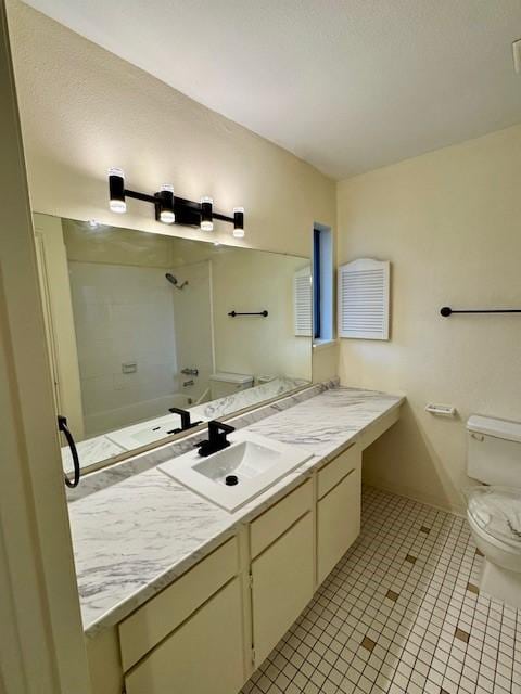 9001 Imogene St Unit A, Houston, TX 77036 - full bathroom with vanity, tile patterned floors, and shower / washtub combination