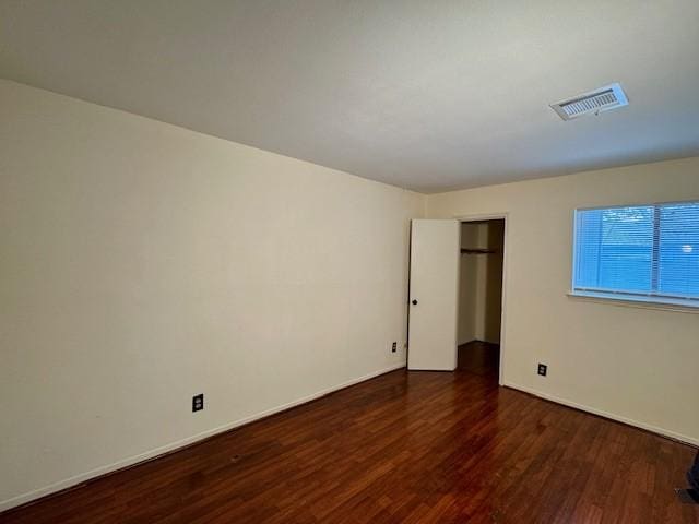 9001 Imogene St Unit A, Houston, TX 77036 - unfurnished bedroom featuring wood finished floors and a closet