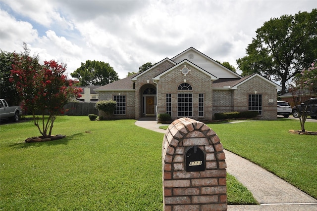 5113 Greenwater Dr, Willis, TX 77318 - traditional home featuring brick siding and roof with shingles