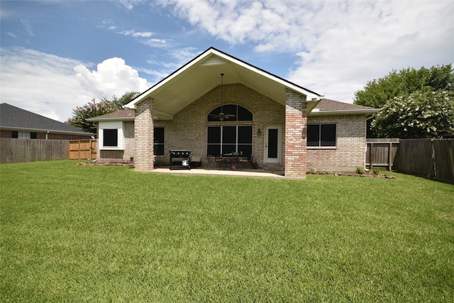 5113 Greenwater Dr, Willis, TX 77318 - back of house with brick siding, a patio area, and a fenced backyard