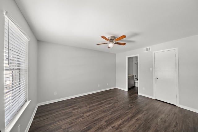 10837 Braes Bend Dr, Houston, TX 77071 - unfurnished bedroom featuring dark wood-style floors and a ceiling fan