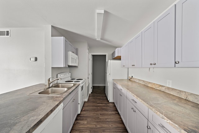 10837 Braes Bend Dr, Houston, TX 77071 - kitchen with white appliances and dark wood finished floors