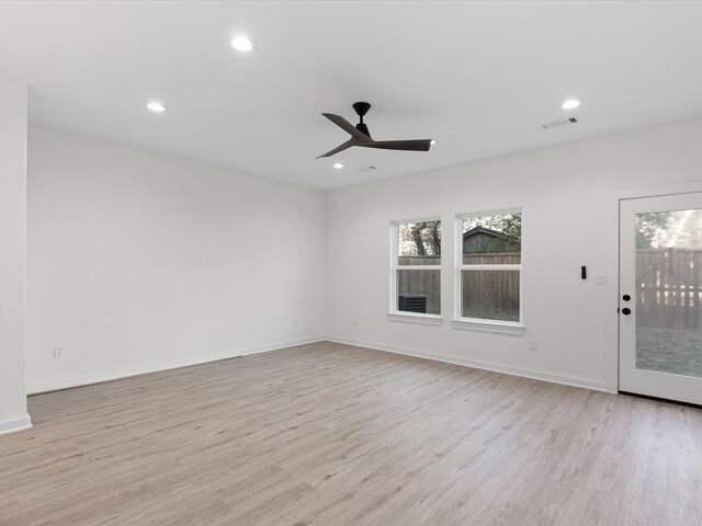 5702 Elysian St, Houston, TX 77009 - empty room with light wood-type flooring, ceiling fan, and recessed lighting